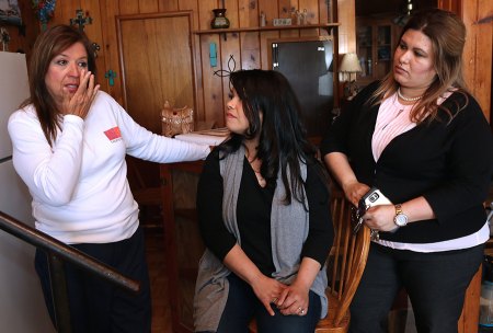 Left to right: Ana Nicks, Josette Bejarano, and Champions Director Crystal Hernandez share a moment in Amanda's Home.